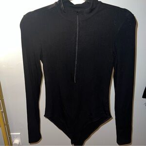 Black body suit with zipper